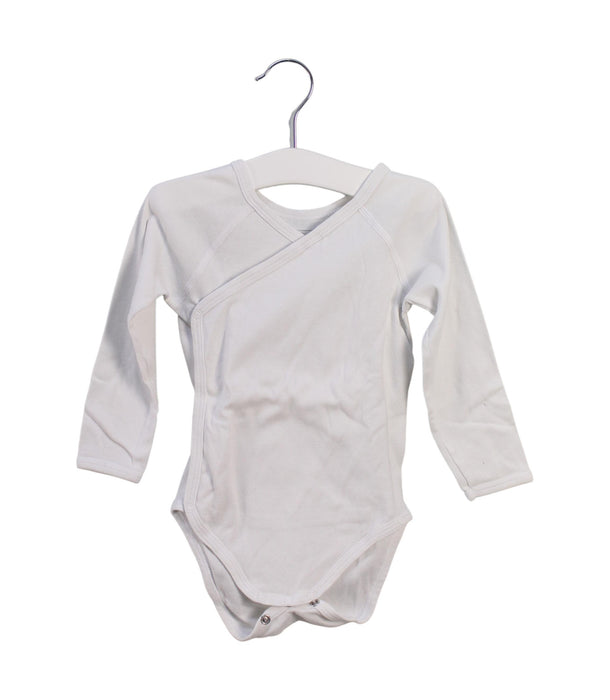 A White Long Sleeve Bodysuits from Petit Bateau in size 6-12M for girl. (Front View)