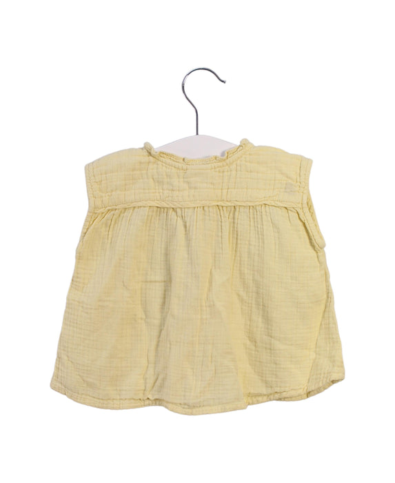 A Yellow Sleeveless Tops from Bonton in size 12-18M for girl. (Back View)