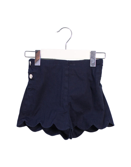 A Navy Shorts from Jacadi in size 4T for girl. (Front View)