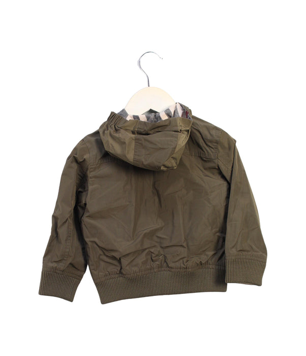 A Green Lightweight Jackets from Burberry in size 2T for boy. (Back View)