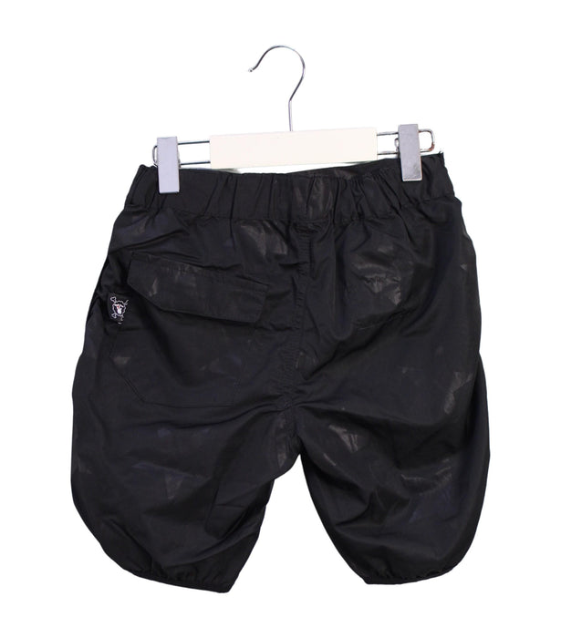 A Black Shorts from Nununu in size 6T for boy. (Back View)