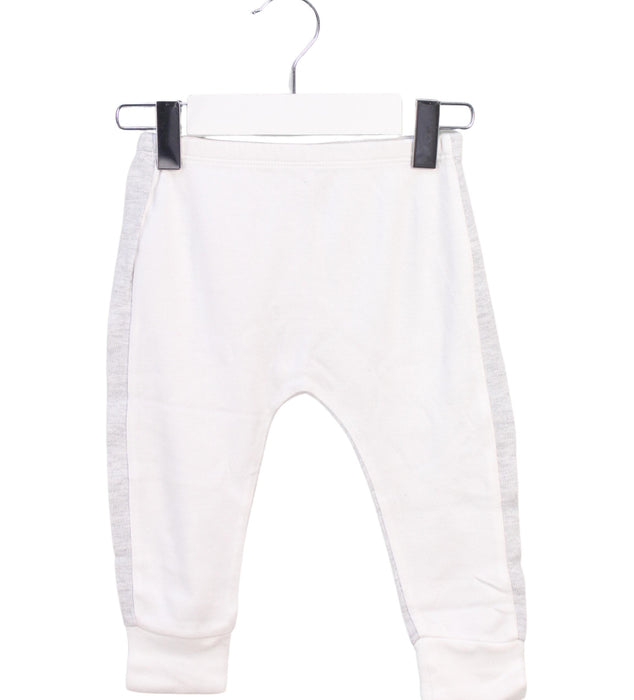 A White Sweatpants from Mori in size 6-12M for girl. (Front View)