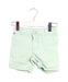 A Green Shorts from Tommy Hilfiger in size 6-12M for girl. (Front View)