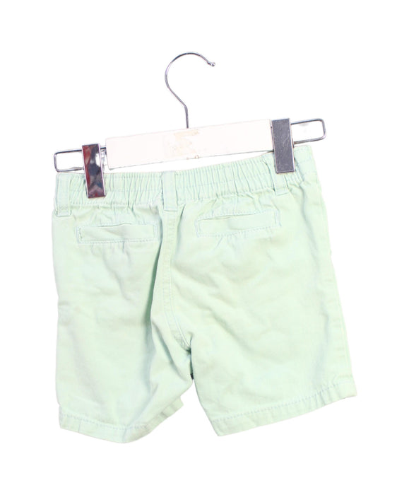 A Green Shorts from Tommy Hilfiger in size 6-12M for girl. (Back View)