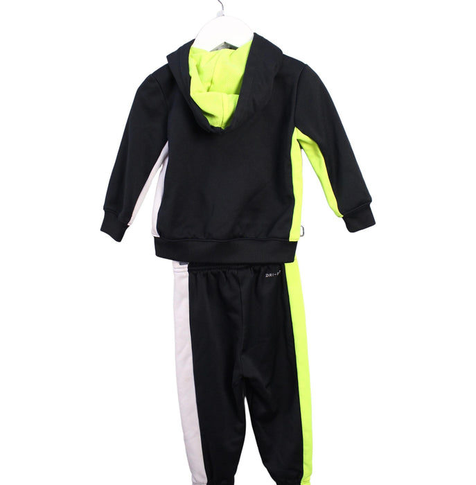 A Black Pants Sets from Nike in size 12-18M for boy. (Back View)