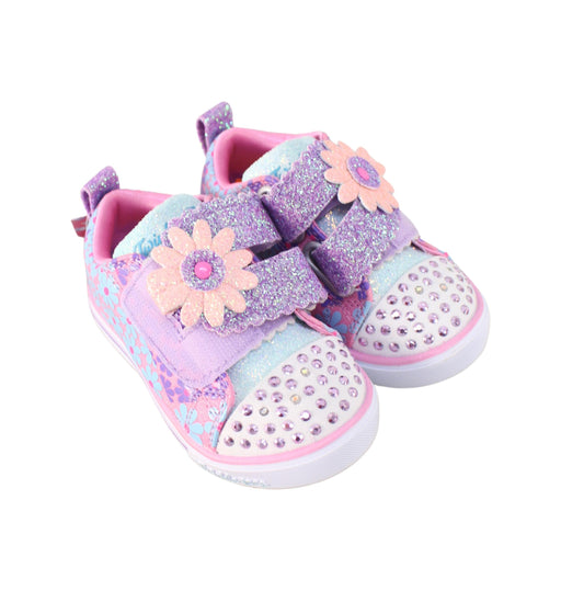 A Pink Sneakers from Skechers in size 12-18M for girl. (Front View)