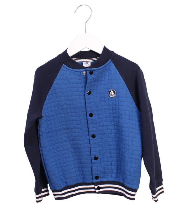 A Blue Lightweight Jackets from Petit Bateau in size 6T for boy. (Front View)