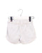 A White Shorts from La Petite Collection in size 2T for girl. (Front View)