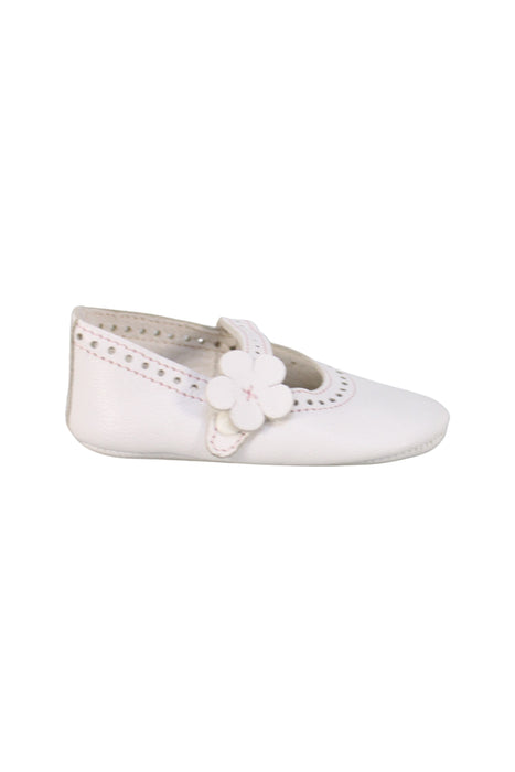 A White Flats from Jacadi in size 6-12M for girl. (Back View)