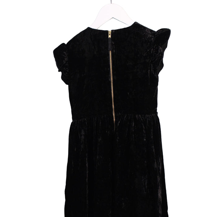 A Black Short Sleeve Dresses from Crewcuts in size 6T for girl. (Back View)