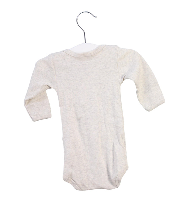 A Beige Long Sleeve Bodysuits from Petit Bateau in size 0-3M for girl. (Back View)