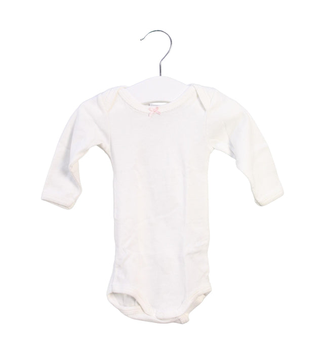 A Ivory Long Sleeve Bodysuits from Petit Bateau in size 0-3M for girl. (Front View)