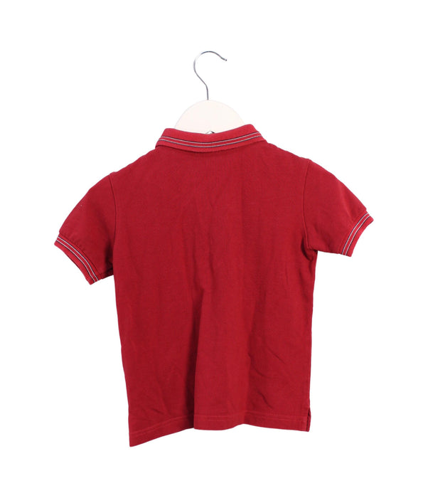 A Burgundy Short Sleeve Polos from Moncler in size 5T for girl. (Back View)