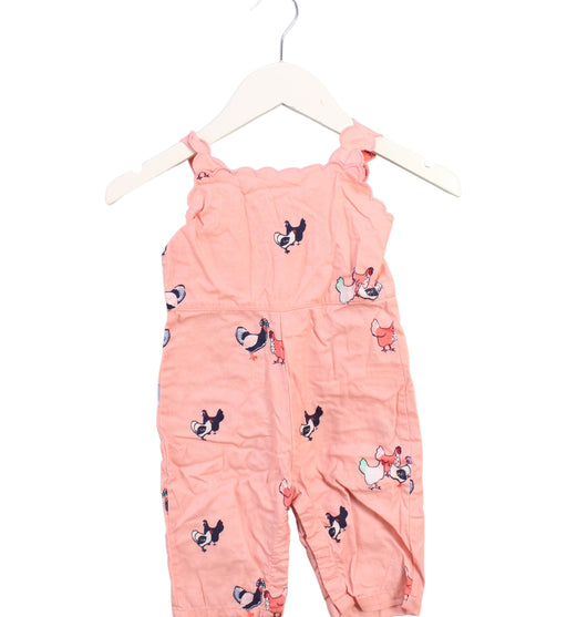 A Pink Sleeveless Rompers from Petit Peony in size 6-12M for girl. (Front View)