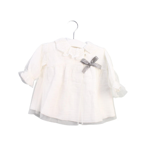 A White Long Sleeve Tops from Nanos in size 3-6M for girl. (Front View)