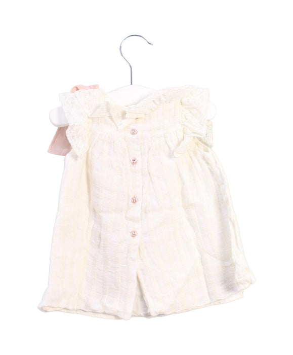 A White Sleeveless Tops from Nanos in size 6-12M for girl. (Back View)