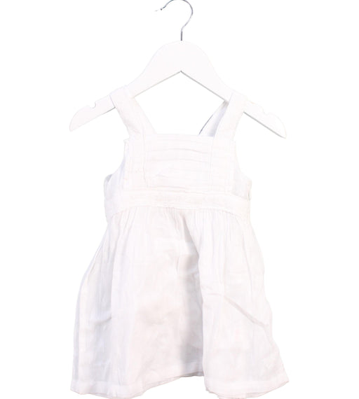 A White Sleeveless Dresses from Tommy Hilfiger in size 6-12M for girl. (Front View)