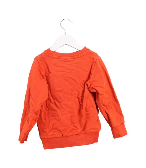 A Orange Crewneck Sweatshirts from Petit Bateau in size 4T for boy. (Back View)