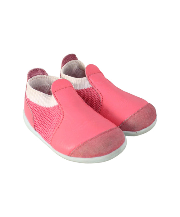 A Pink Slip Ons from Bobux in size 6-12M for girl. (Front View)