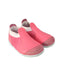 A Pink Slip Ons from Bobux in size 6-12M for girl. (Front View)