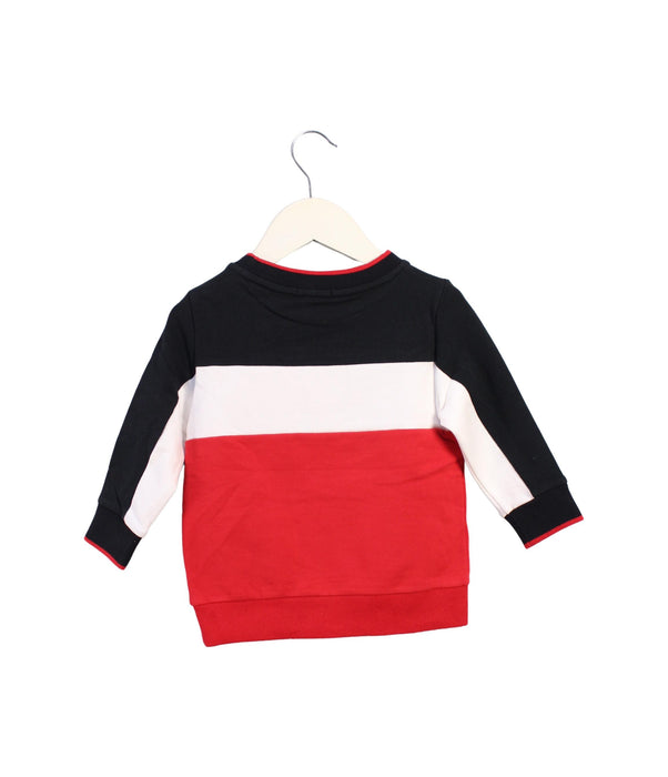 A Red Sweatshirts from Ferrari in size 12-18M for boy. (Back View)