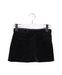 A Black Short Skirts from Bonpoint in size 4T for girl. (Front View)