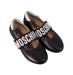 A Black Flats from Moschino in size 3T for girl. (Front View)