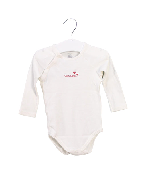 A Ivory Long Sleeve Bodysuits from Petit Bateau in size 6-12M for girl. (Front View)