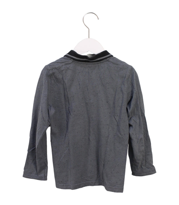 A Grey Long Sleeve Polos from Little Marc Jacobs in size 6T for boy. (Back View)