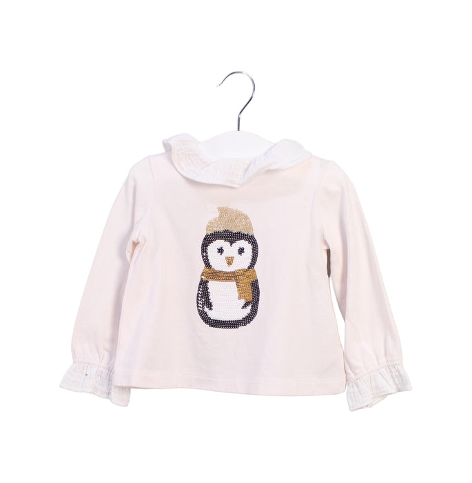 A White Long Sleeve Tops from Nanos in size 6-12M for girl. (Front View)