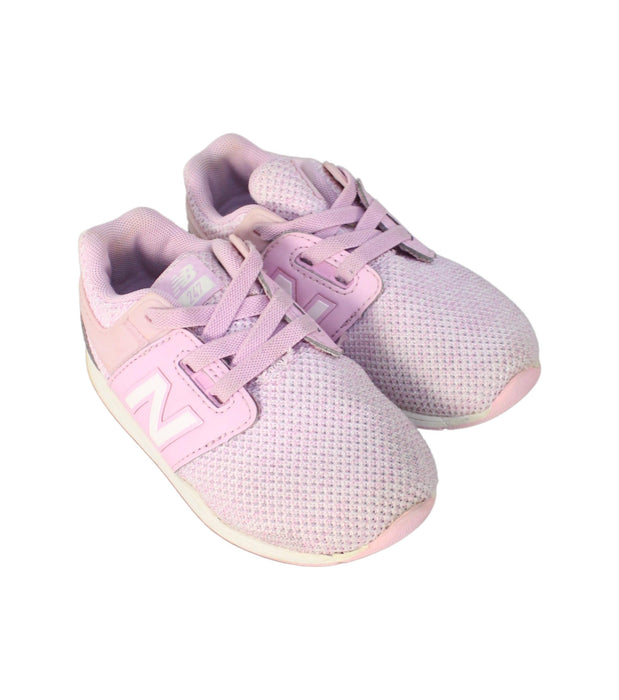 A Pink Sneakers from New Balance in size 4T for girl. (Front View)