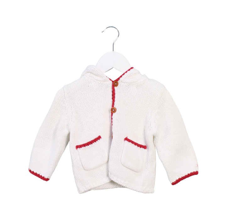 A White Cardigans from Jacadi in size 3-6M for neutral. (Front View)