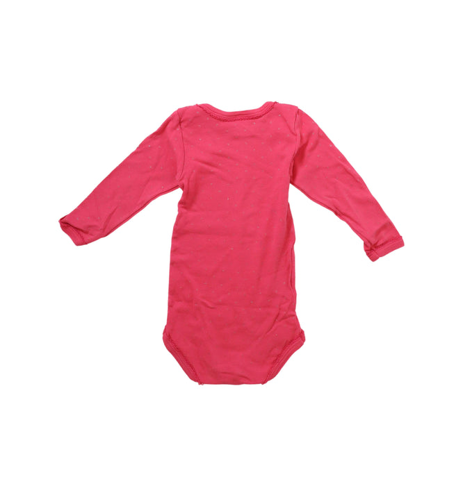 A Pink Long Sleeve Bodysuits from Petit Bateau in size 6-12M for girl. (Back View)