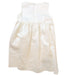 A Ivory Sleeveless Dresses from Chickeeduck in size 5T for girl. (Back View)