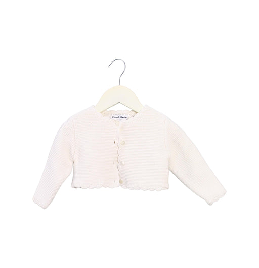 A White Cardigans from Sarah Louise in size 6-12M for girl. (Front View)