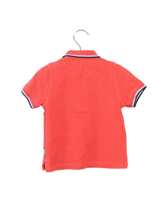 A Orange Short Sleeve Polos from Boss in size 6-12M for boy. (Back View)