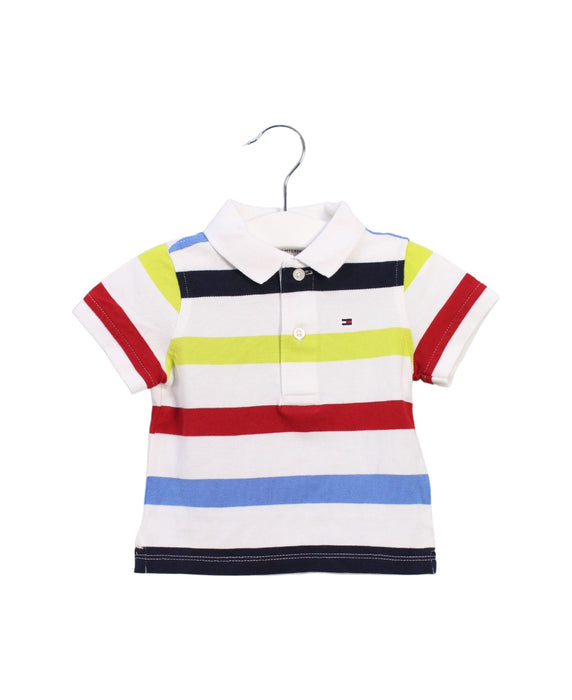 A White Short Sleeve Polos from Tommy Hilfiger in size 6-12M for boy. (Front View)