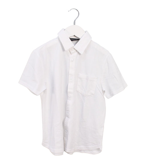 A White Shirts from Comme Ca Ism in size 7Y for boy. (Front View)