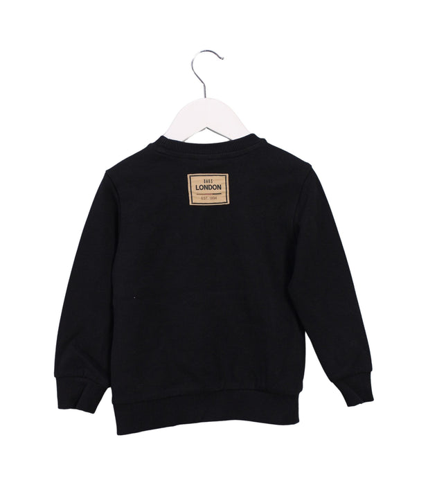 A Black Crewneck Sweatshirts from Daks in size 3T for boy. (Back View)