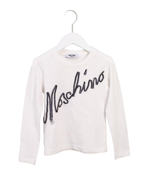 A White Long Sleeve Tops from Moschino in size 6T for girl. (Front View)