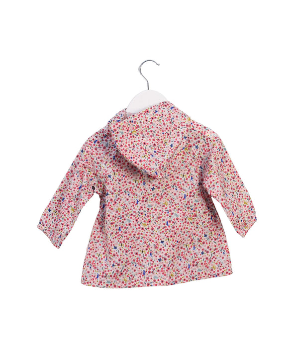 A Pink Lightweight Jackets from Petit Bateau in size 12-18M for girl. (Back View)