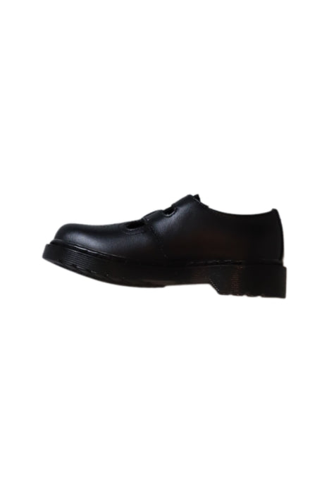 A Black Flats from Dr. Martens in size 7Y for girl. (Back View)