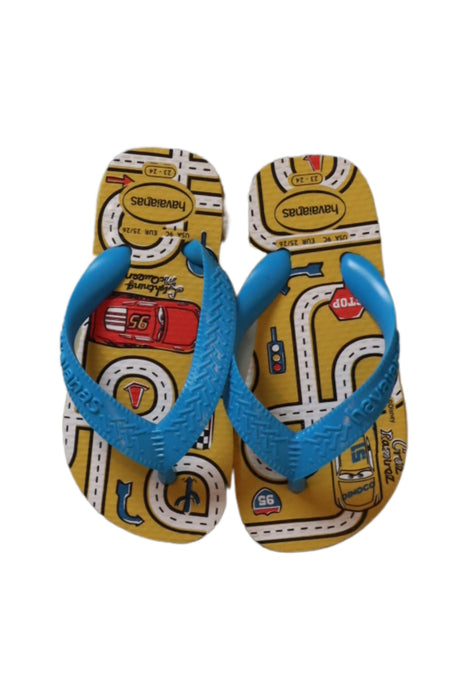 A Yellow Flip Flops from Havaianas in size 3T for girl. (Front View)