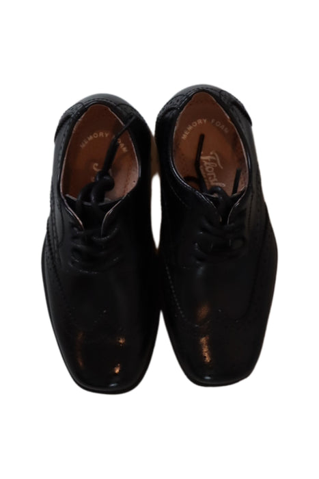 A Black Dress Shoes from Florsheim in size 4T for boy. (Front View)