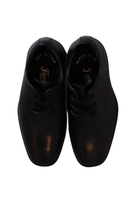 A Black Dress Shoes from Florsheim in size 4T for boy. (Front View)