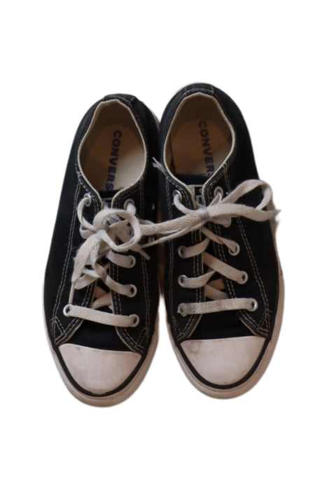 A Black Sneakers from Converse in size 7Y for girl. (Front View)