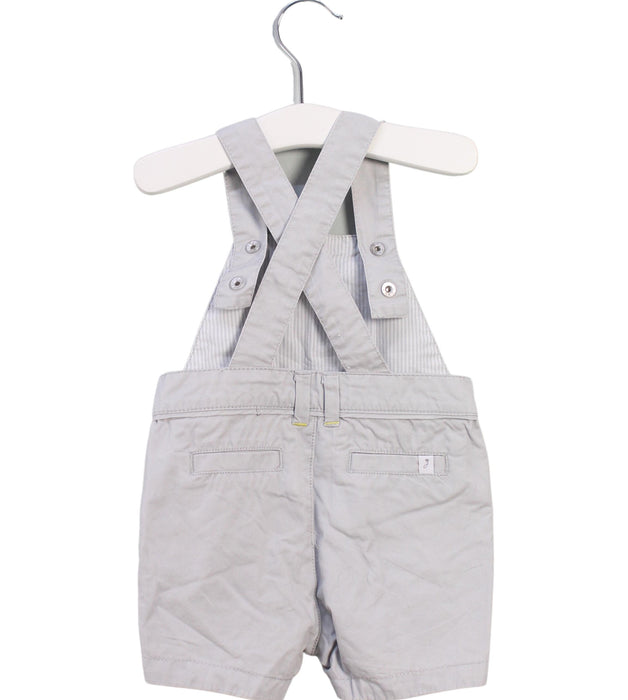 A Grey Overall Shorts from Jacadi in size 3-6M for girl. (Back View)