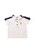 A White Short Sleeve Polos from Jacadi in size 3-6M for boy. (Front View)