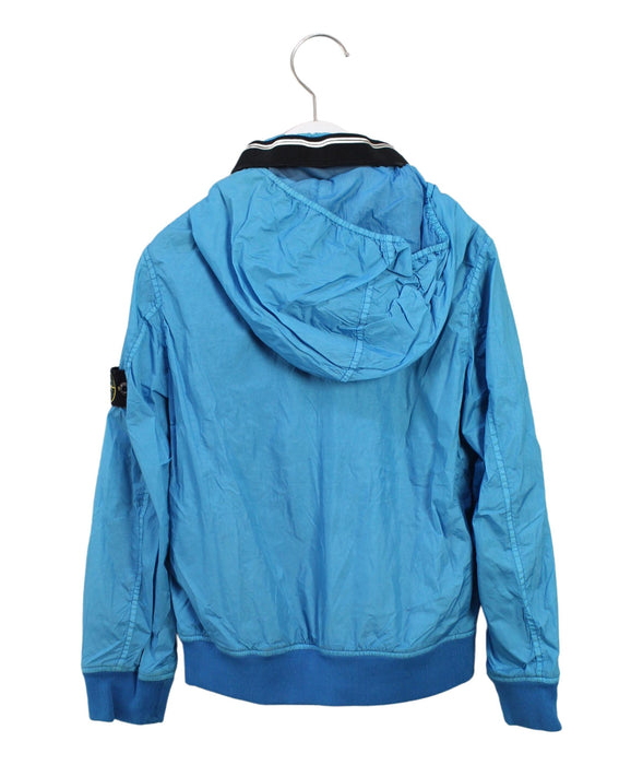 A Blue Lightweight Jackets from Stone Island in size 8Y for boy. (Back View)