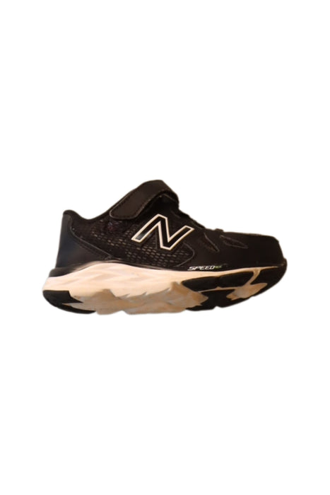 A Black Sneakers from New Balance in size 3T for boy. (Back View)